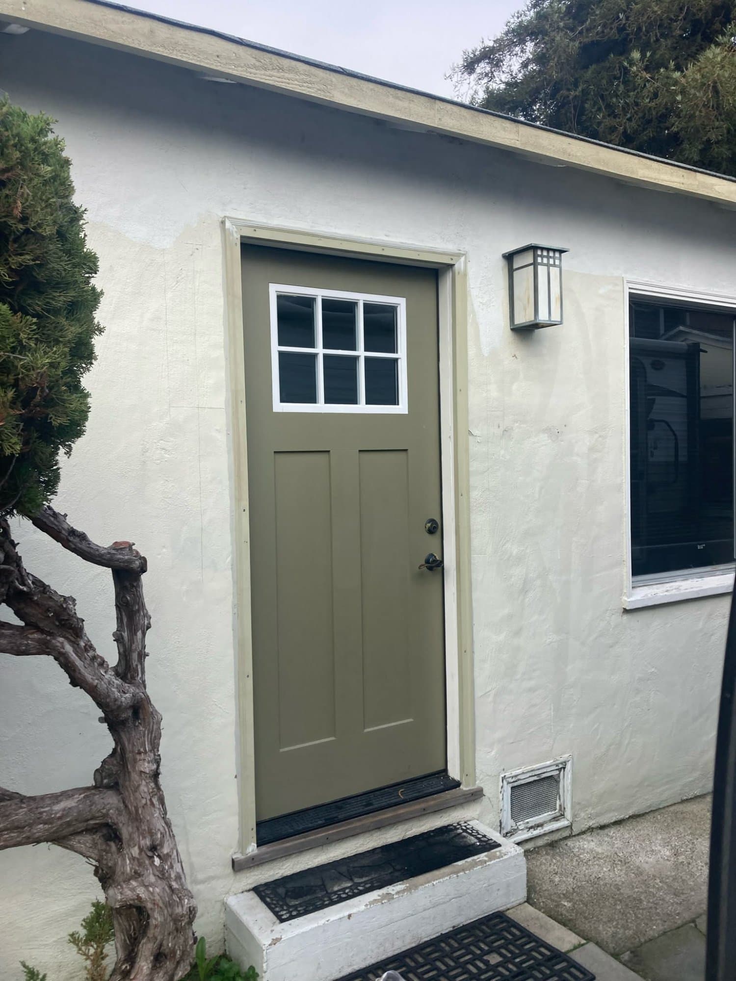 Door installation and exterior finishing by Kevin Breunig